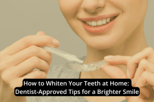 A woman smiles while holding a clear teeth whitening tray. Text overlay reads: “How to Whiten Your Teeth at Home: Dentist-Approved Tips for a Brighter Smile—plus signs you may need more than whitening.”.